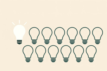 Multiple light bulbs in a pattern, with some lighter and some darker, on a light background.