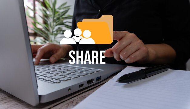 A person sharing a file with other people using the word "SHARE" and with group icon and capera, with a laptop, a business concept banner design for digital documents shared online,