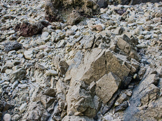Rough rocky surface on the beach