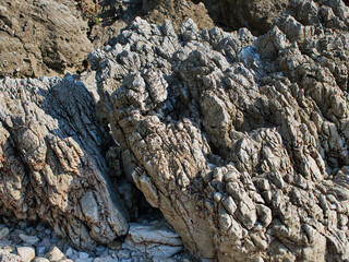 Rough rocky surface on the beach
