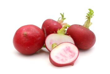 Red radish and green leaves on white background