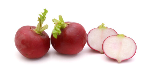 Three radishes. Three ripe radishes against white background