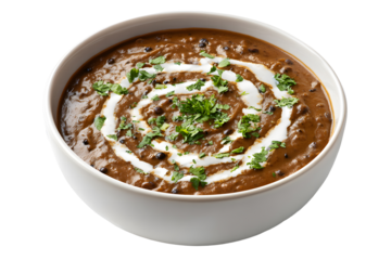Traditional Indian dal makhani served in white bowl garnished with cream and fresh coriander leaves isolated on transparent background