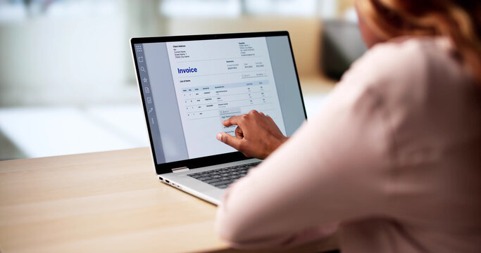 Woman Managing Finances With E-invoice Tax Software