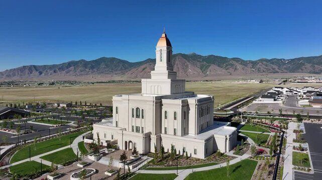 Aerial LDS Deseret Peak Tooele Utah Temple mountain valley circle. The Church of Jesus Christ of Latter-day Saints, LDS or Mormon religion. Christian religious groups. Sacred building eternal worship.