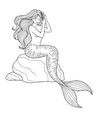 Mermaid brushing hair on a rock