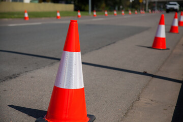 Road cones along a road to stop people parking  for a parade