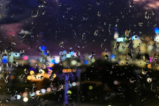 Wet Window with blurred view of Melbourne in Background