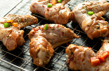Chicken wings ready for grilling.