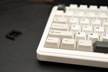 Photograph of white mechanical keyboard detail for tech content product photography close-up office...