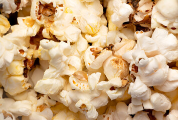 popcorn background, closeup macro detail, snack food for movies and cinema