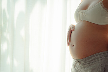pregnant woman's belly.