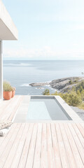 Modern poolside retreat with ocean view on a sunny day