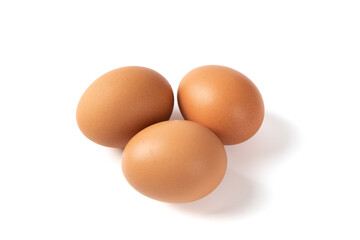 brown raw chicken eggs isolated on white background