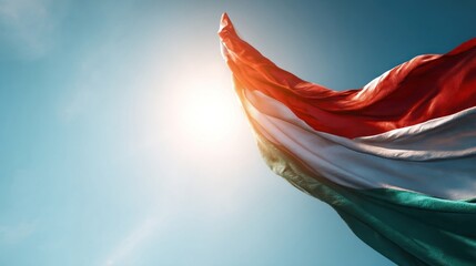 Tricolor flag waving in the wind under bright daylight
