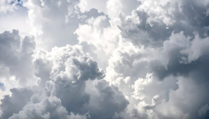 Dramatic cloud formation with swirling shapes and soft sunlight creates dreamy, peaceful sky scene, evoking sense of wonder and tranquility