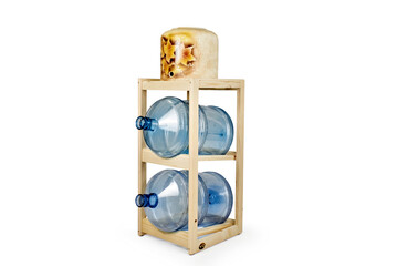 Ceramic gallon on a wooden stand with two water bottles isolated on a white background. Water dispenser.