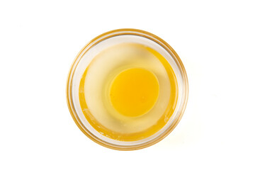 bowl of raw egg ingredients isolated on white background
