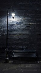 A solitary bench beneath an old-fashioned lamp casts a quiet, moody aura against a dark brick wa