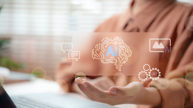 Futuristic AI technology interface with human hand holding virtual digital brain circuit, representing artificial intelligence innovation and automation system.