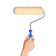 Hand holding blue paint roller on white background