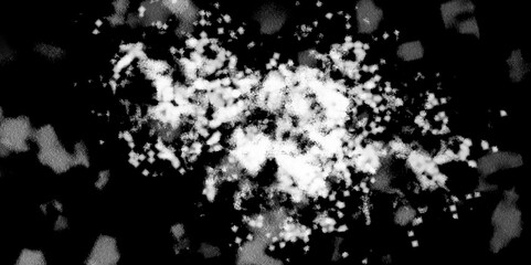 Snowflakes on dark background. white icy snowflakes isolated on black background, natural background. white crystalline powder on a black background. sugar dust. texture, pattern and clipping.