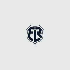Stylized logo featuring initials F L R encased in a crest badge emblem