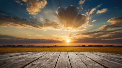Wooden deck at sunset over a golden field