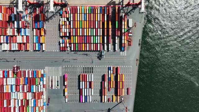 Directly above aerial view of container yard.