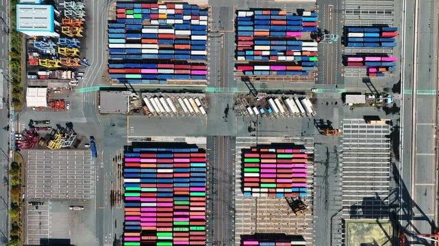 Directly above aerial view of container yard.