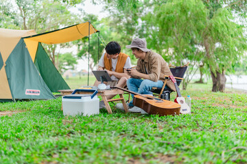 Friends Gaming at Campsite