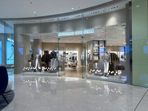 Brunello Cucinelli luxury fashion store facade and interior in upscale shopping mall
