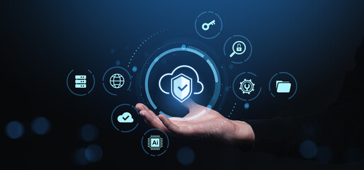 Cloud data protection and security icons floating over hand on dark background.