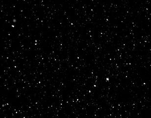 Obraz premium Black background with scattered white specks (1)