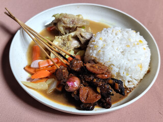 Goulash satay. Sate gulai is a traditional Indonesian culinary menu, curry satay cooked using spices.
