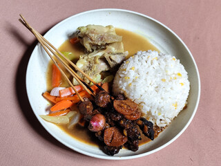 Goulash satay. Sate gulai is a traditional Indonesian culinary menu, curry satay cooked using...