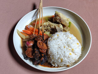 Goulash satay. Sate gulai is a traditional Indonesian culinary menu, curry satay cooked using spices.