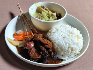 Goulash satay. Sate gulai is a traditional Indonesian culinary menu, curry satay cooked using...