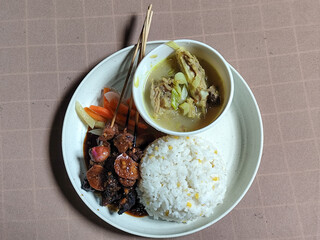 Goulash satay. Sate gulai is a traditional Indonesian culinary menu, curry satay cooked using...