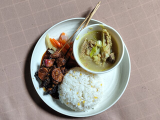 Goulash satay. Sate gulai is a traditional Indonesian culinary menu, curry satay cooked using spices.