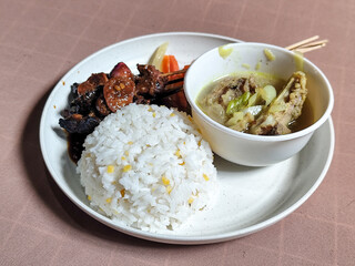 Goulash satay. Sate gulai is a traditional Indonesian culinary menu, curry satay cooked using spices.