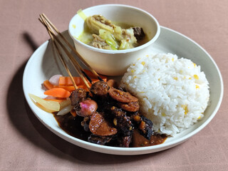 Goulash satay. Sate gulai is a traditional Indonesian culinary menu, curry satay cooked using...
