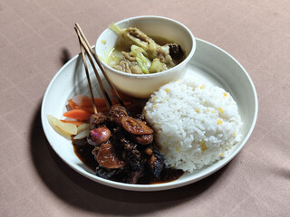 Goulash satay. Sate gulai is a traditional Indonesian culinary menu, curry satay cooked using spices.
