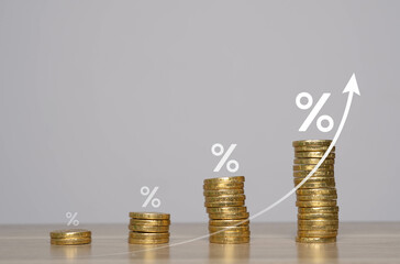 A visual representation of increasing monetary growth, featuring stacks of coins and a rising percentage graph.