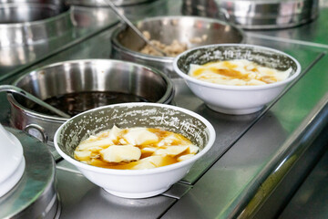 A delicious bowl of soft tofu pudding, known as 
