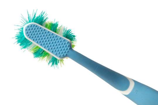 old used toothbrush on a white background