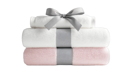 Stack of soft, white and rose-pink towels, tied with a gray ribbon