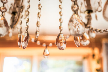 Transparent crystal pendants on ceiling lamp