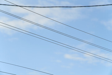 Fototapeta premium Electric lines in natural sky backdrop