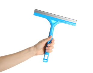 Hand holding a blue window squeegee tool.